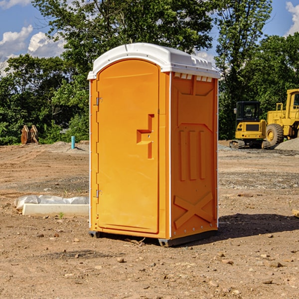 how often are the portable restrooms cleaned and serviced during a rental period in Mason City IA